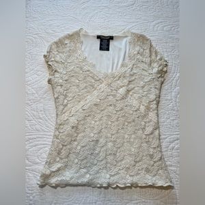 Rampage short sleeve lace top.
Cream/off white color. Size small.
